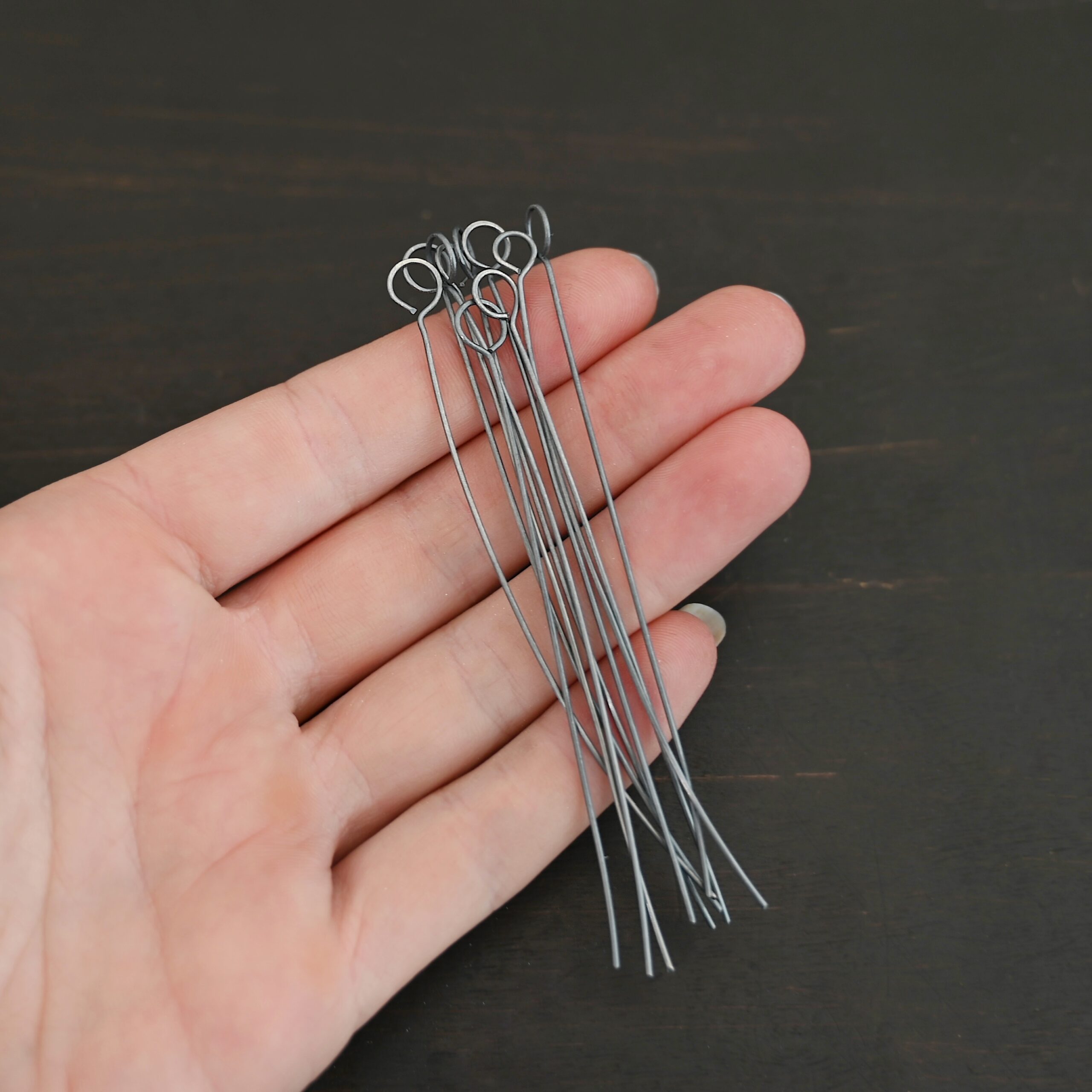 Eyepin oxidized 10pcs shown in hand
