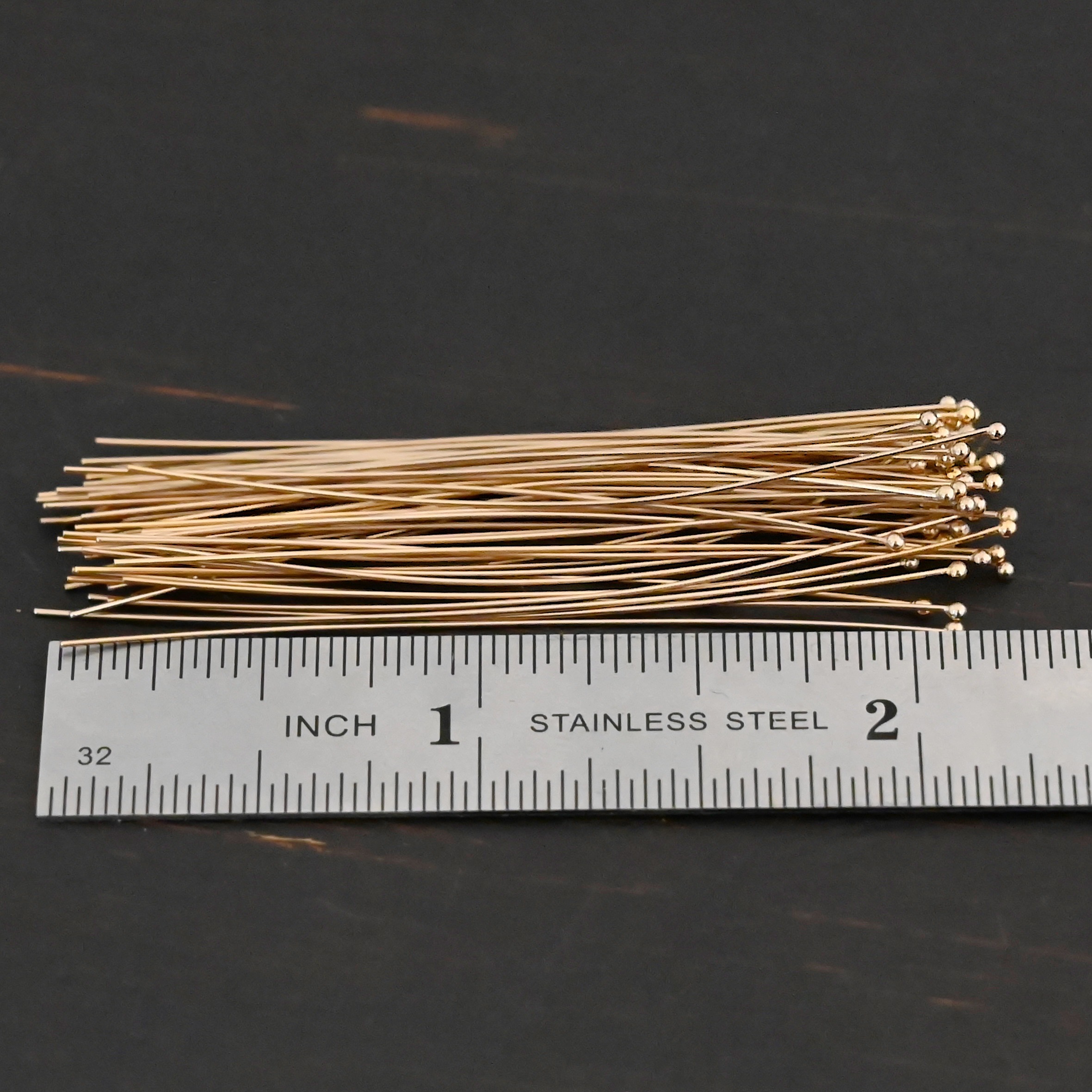 Gold Filled Ball Headpins shown by ruler