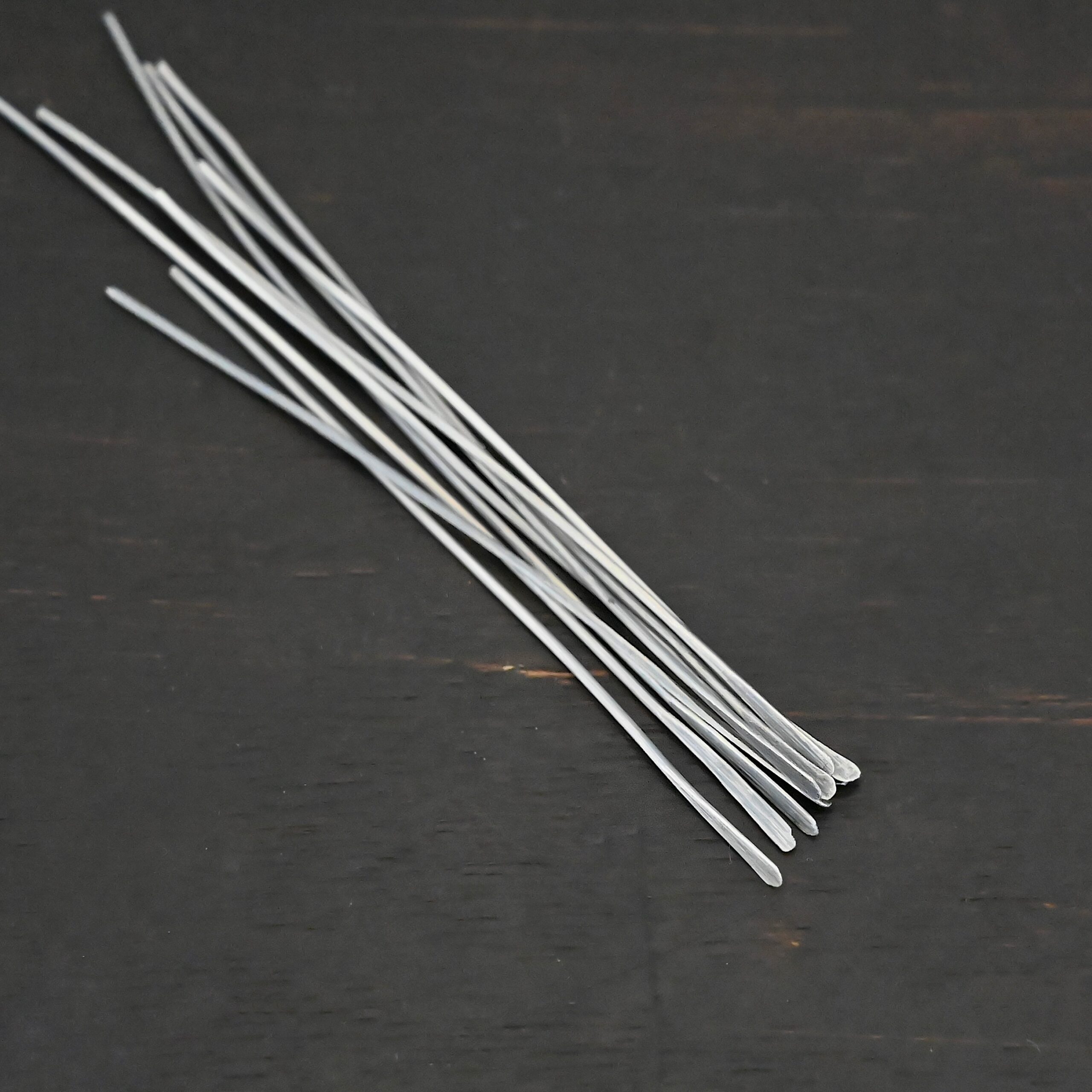 Silver Oxidized Paddle Headpins shown on dark background