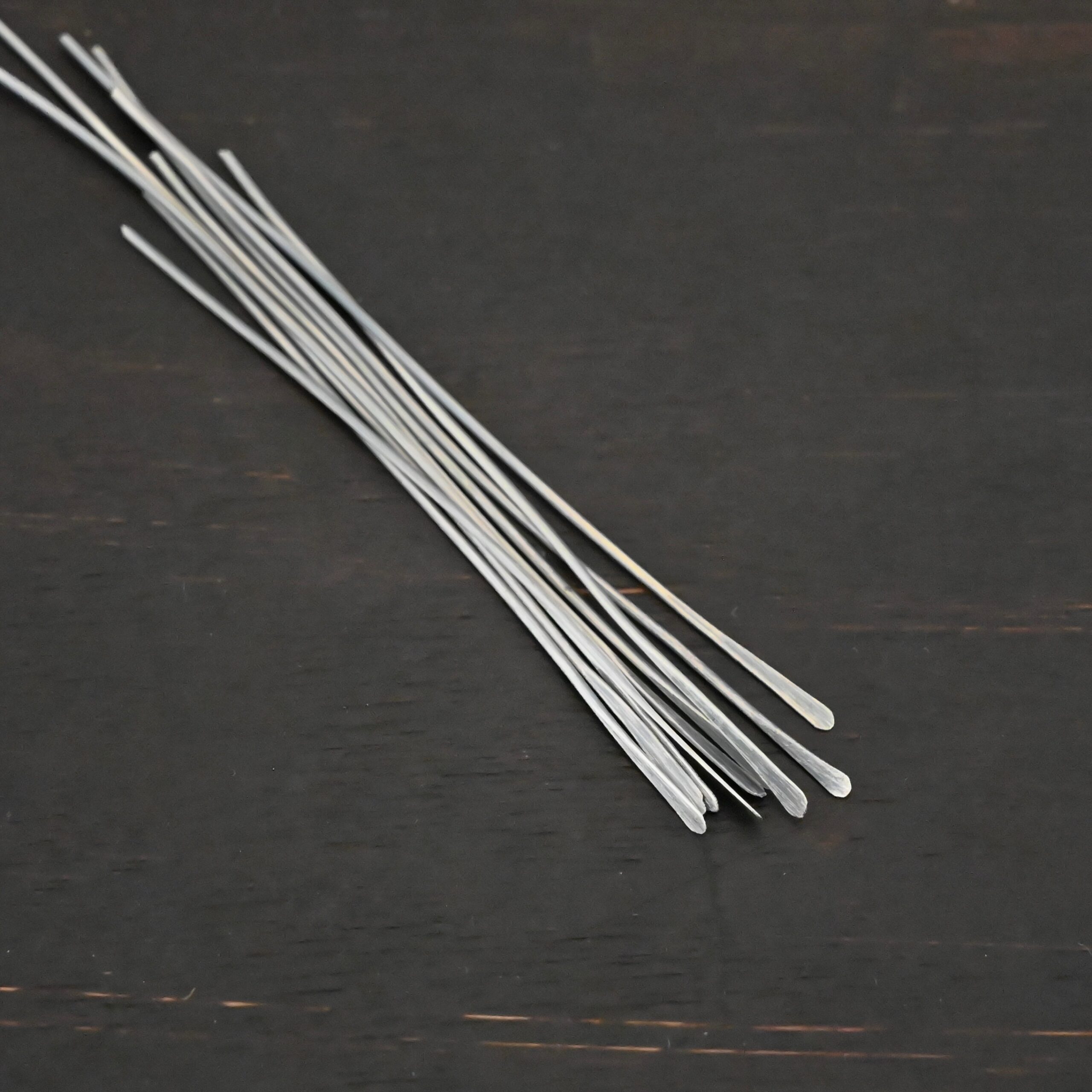 Silver Oxidized Paddle Headpins shown on dark background