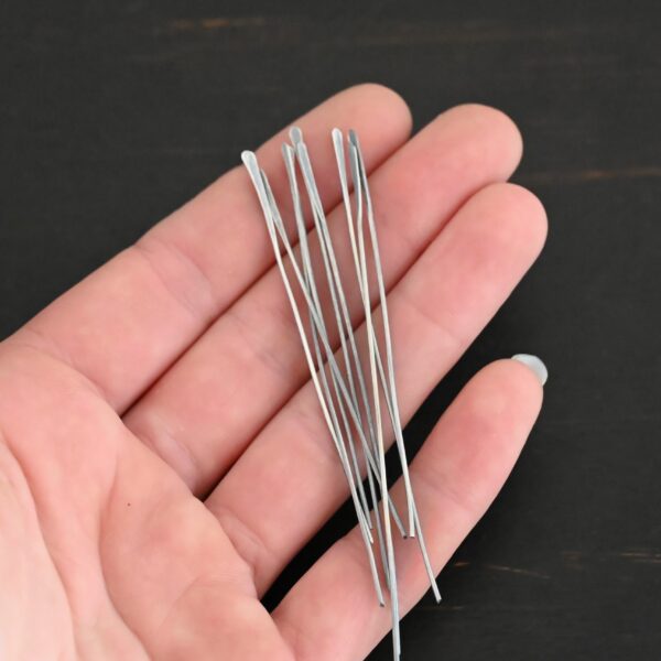 Silver Oxidized Paddle Headpins shown in hand