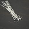 Silver Shiny Round Dot headpins shown on dark background
