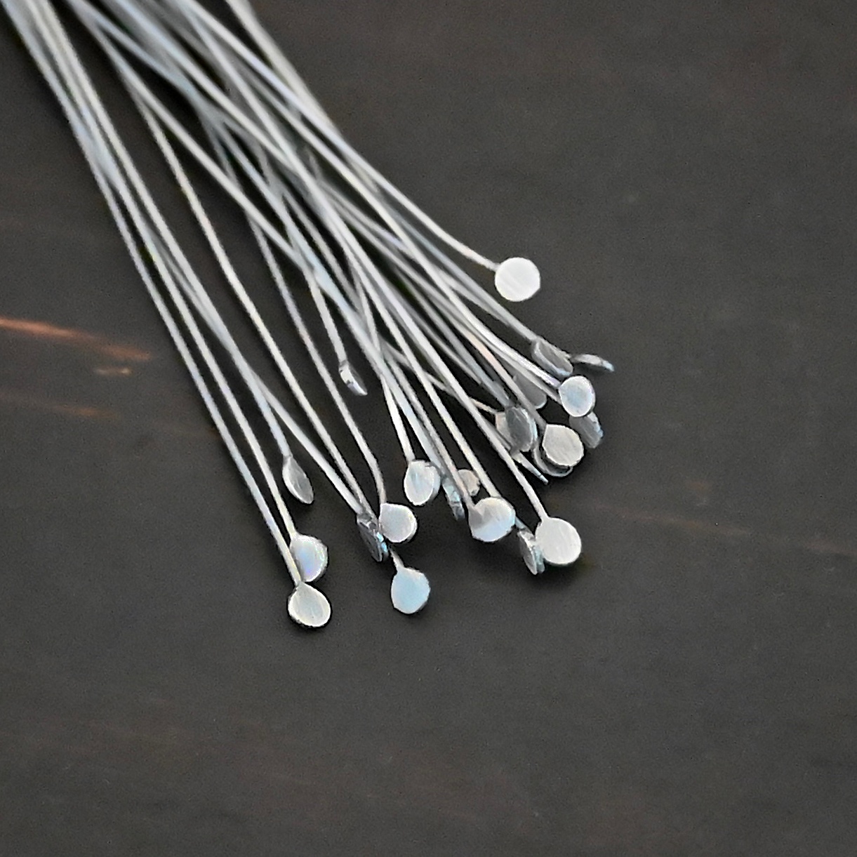 Round Dot Headpin Ox Silver Oxidized Round Dot headpins shown on dark background