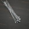 Silver Oxidized Round Dot headpins shown on dark background
