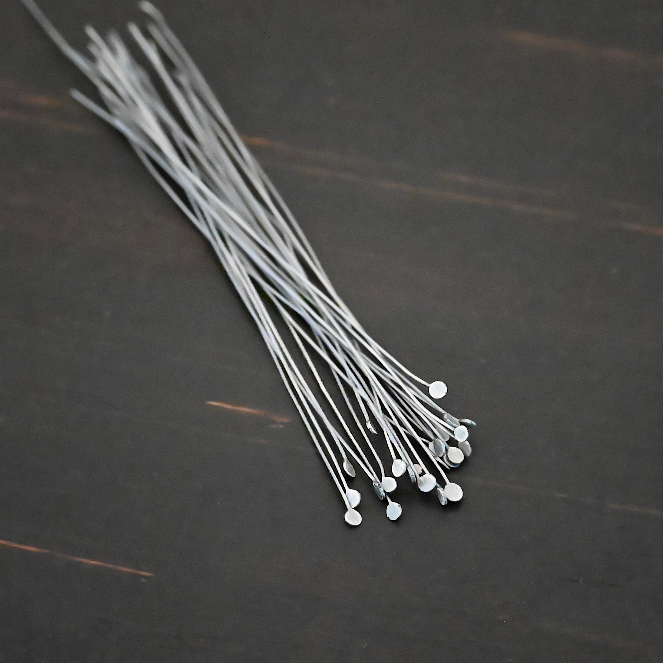 Round Dot Headpin Ox Silver Oxidized Round Dot headpins shown on dark background