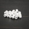 Silver Shiny cubed Beads shown on dark background