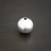 Silver Shiny Hollow bead shown on dark background
