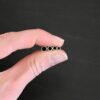 Silver oxidized end caps shown in hand
