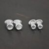 Silver shiny 2mm & 3mm crimps shown on dark background