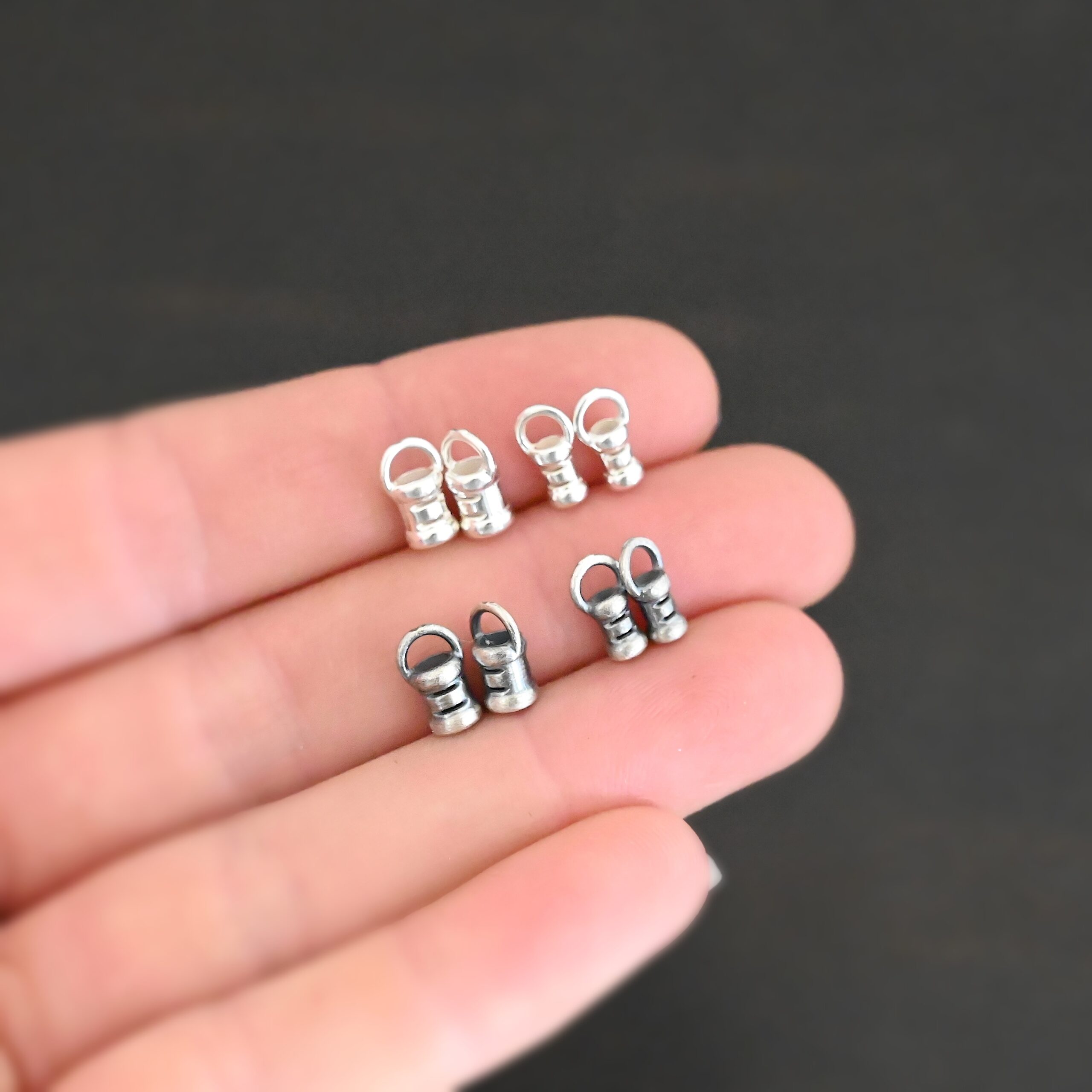 Silver shiny & oxidized 2mm & 3mm crimps shown in hand