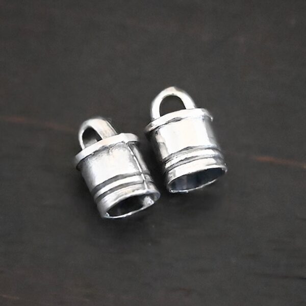 Silver Shiny 6x9mm end caps shown on dark background