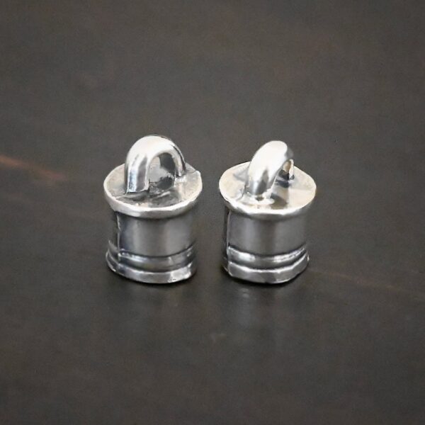 Silver Shiny 6x9mm end caps shown on dark background