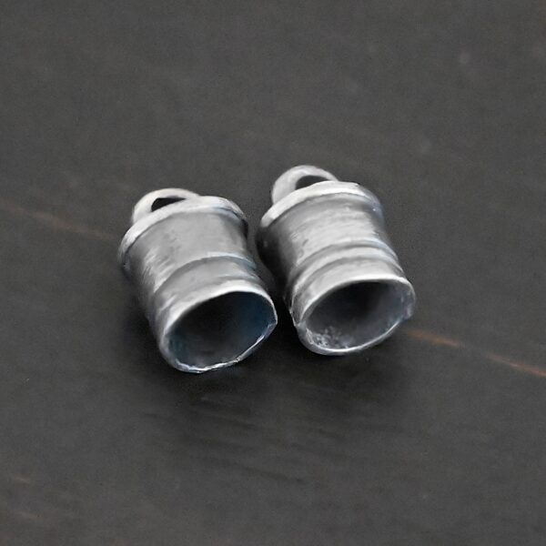 Silver Oxidized 6x9mm end caps shown on dark background