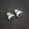 Silver Shiny Cone Flower Bead Caps shown on dark background