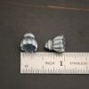 Silver oxidized cone flower bead cap shown by ruler