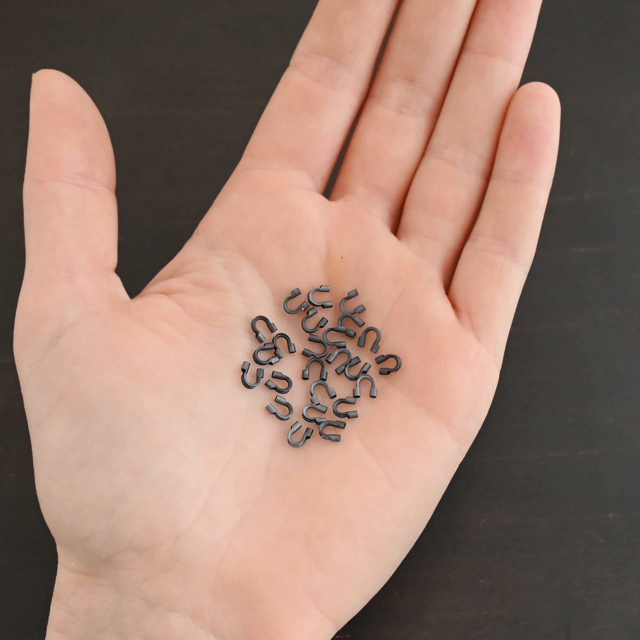 Wire Guards ox large Silver oxidized large wire guards shown in hand