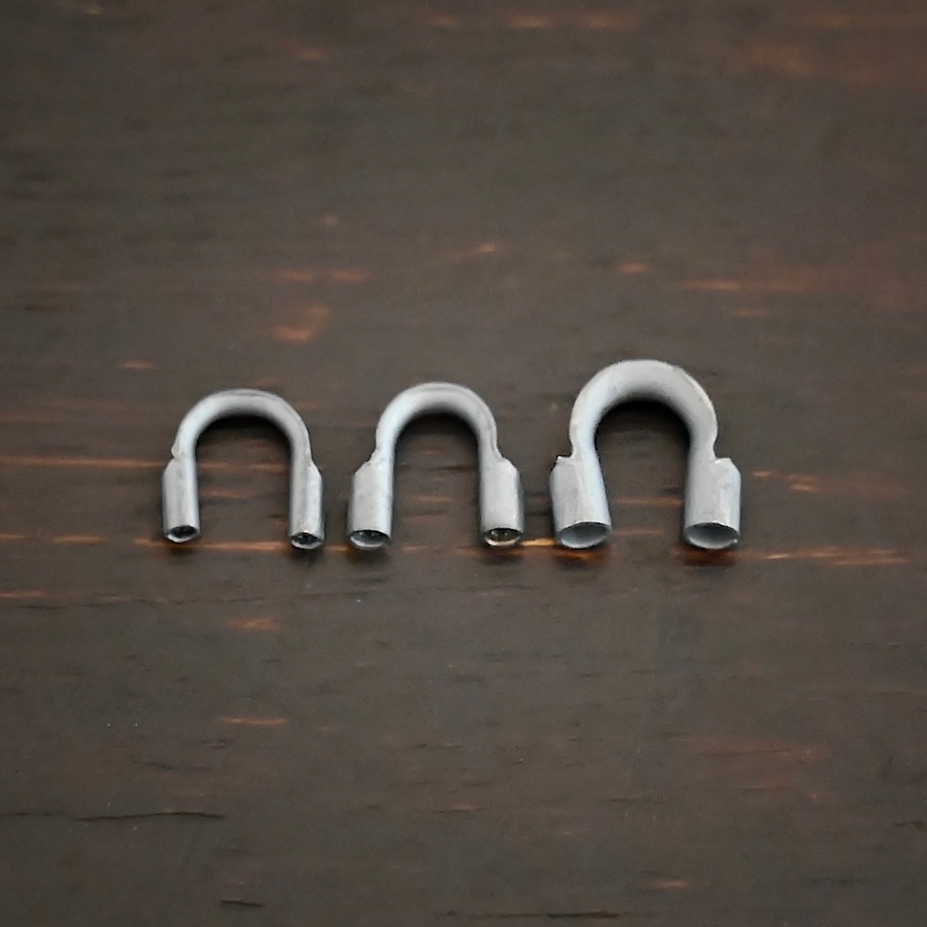 Wire Guards ox Silver oxidized wire guards shown on dark background