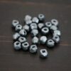 Silver oxidized cubed beads shown on dark background