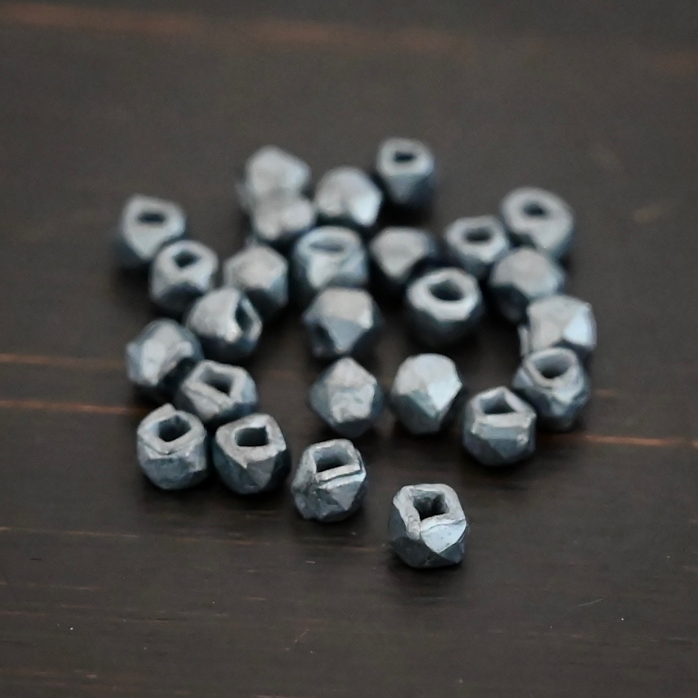 Cubed Beads ox Silver oxidized cubed beads shown on dark background