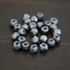 Silver oxidized cubed beads shown on dark background