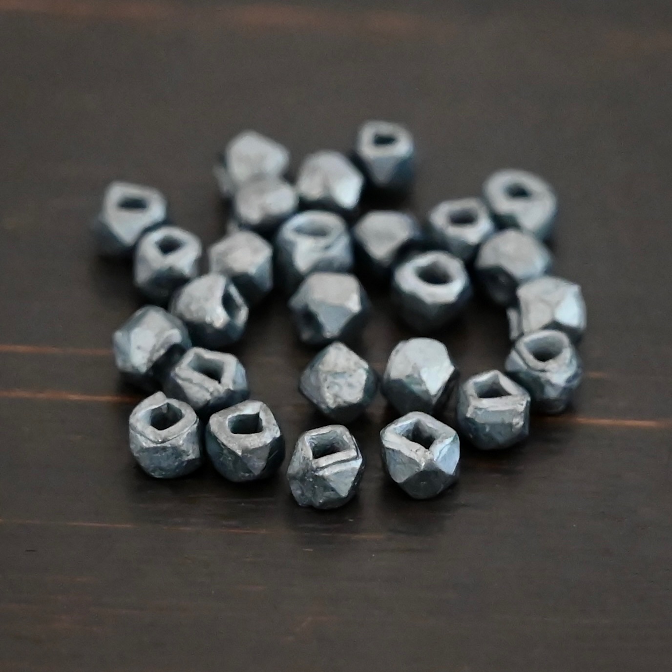 Cubed Beads ox Silver oxidized cubed beads shown on dark background