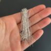 Small Shiny Silver Ball Headpins shown in hand
