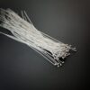 Small Shiny Silver Ball Headpins shown on dark background