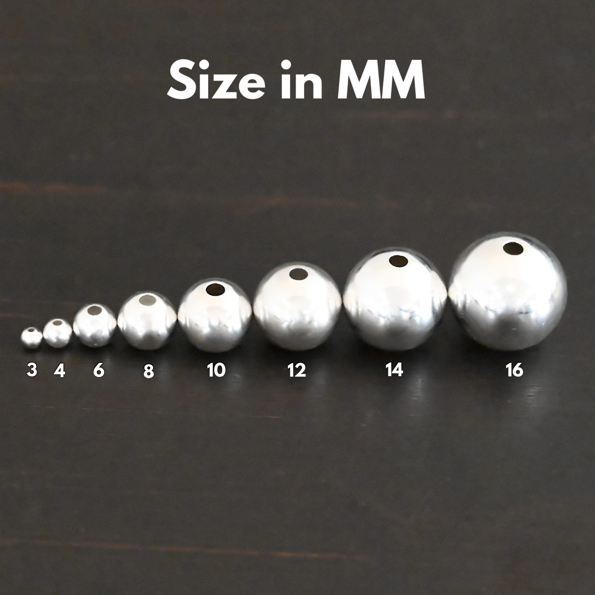 Silver Shiny Hollow beads shown on dark background