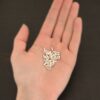 3/32x1/5 Silver plated eyelets shown in hand