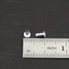 3/32x1/5 Silver plated eyelets shown by ruler