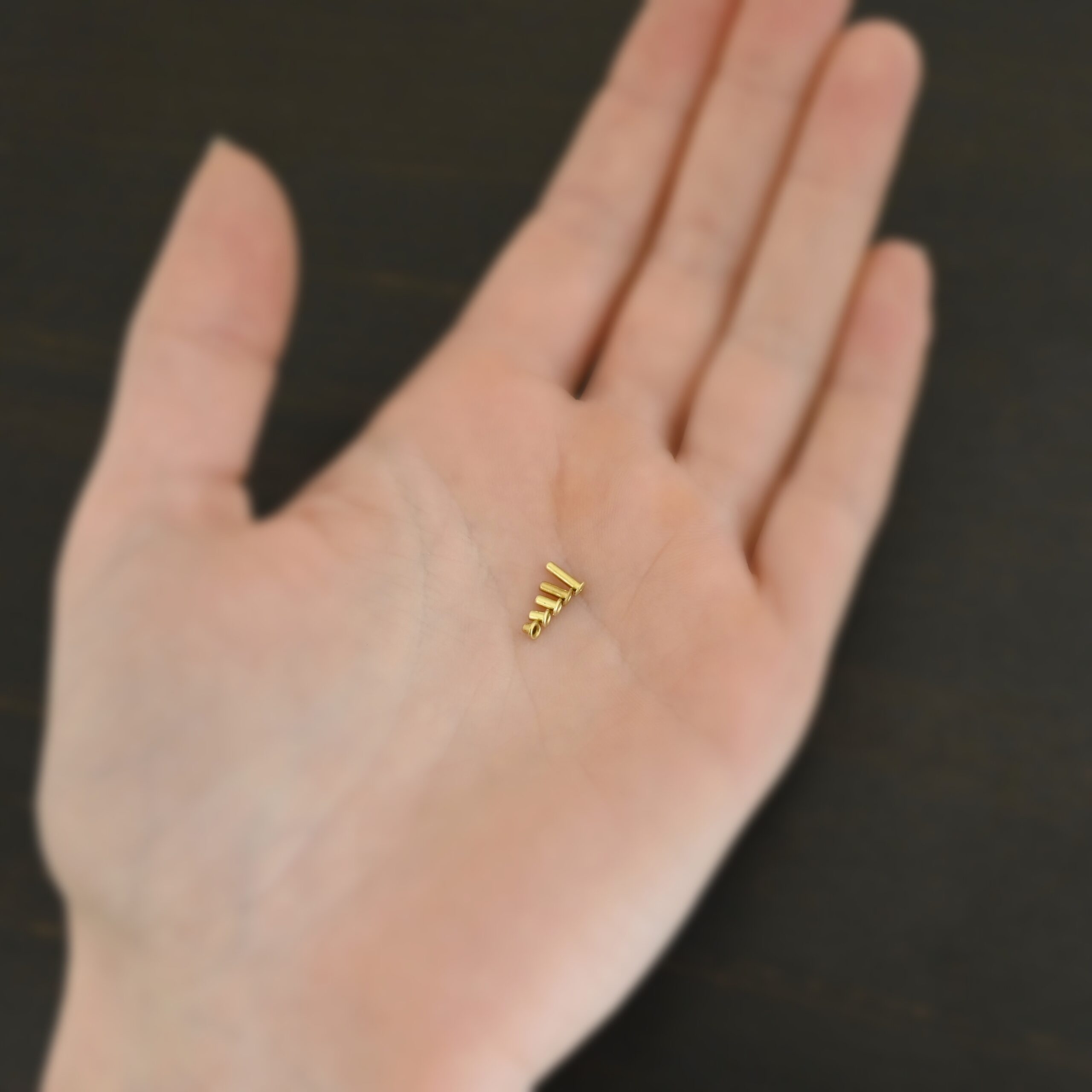 Brass eyelets mix of all shown in hand