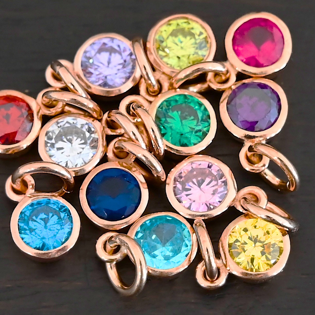 Rose Gold Plated 6mm Birthstone Rose Gold Plated 6mm Birthstone Charm shown on dark background