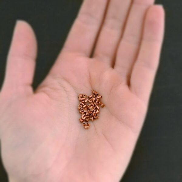 1/16x3/32 Copper Rivets shown in hand