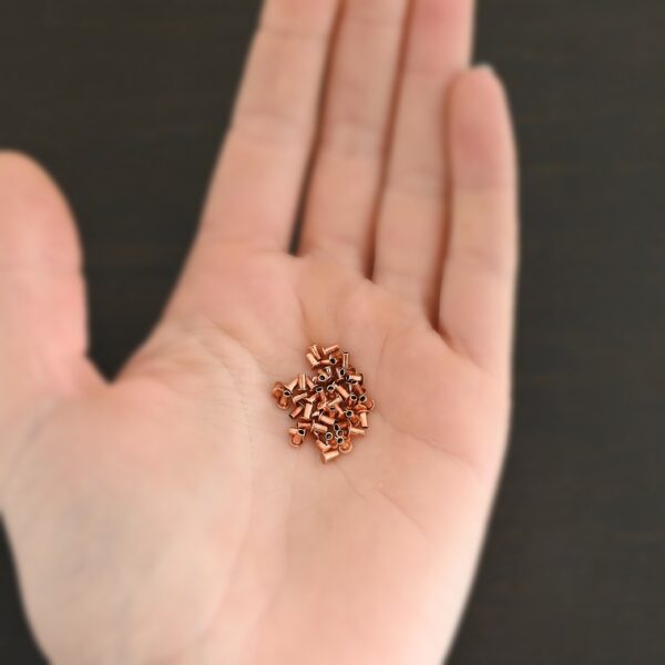 1/16x1/8 Copper Rivets shown in hand