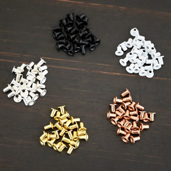 1/16x3/32 eyelets for EZ Riveter shown on dark background