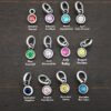 Silver oxidized 4mm Birthstone Charms shown on dark background