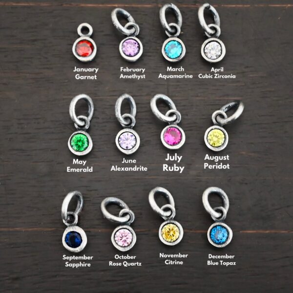 Silver oxidized 4mm Birthstone Charms shown on dark background