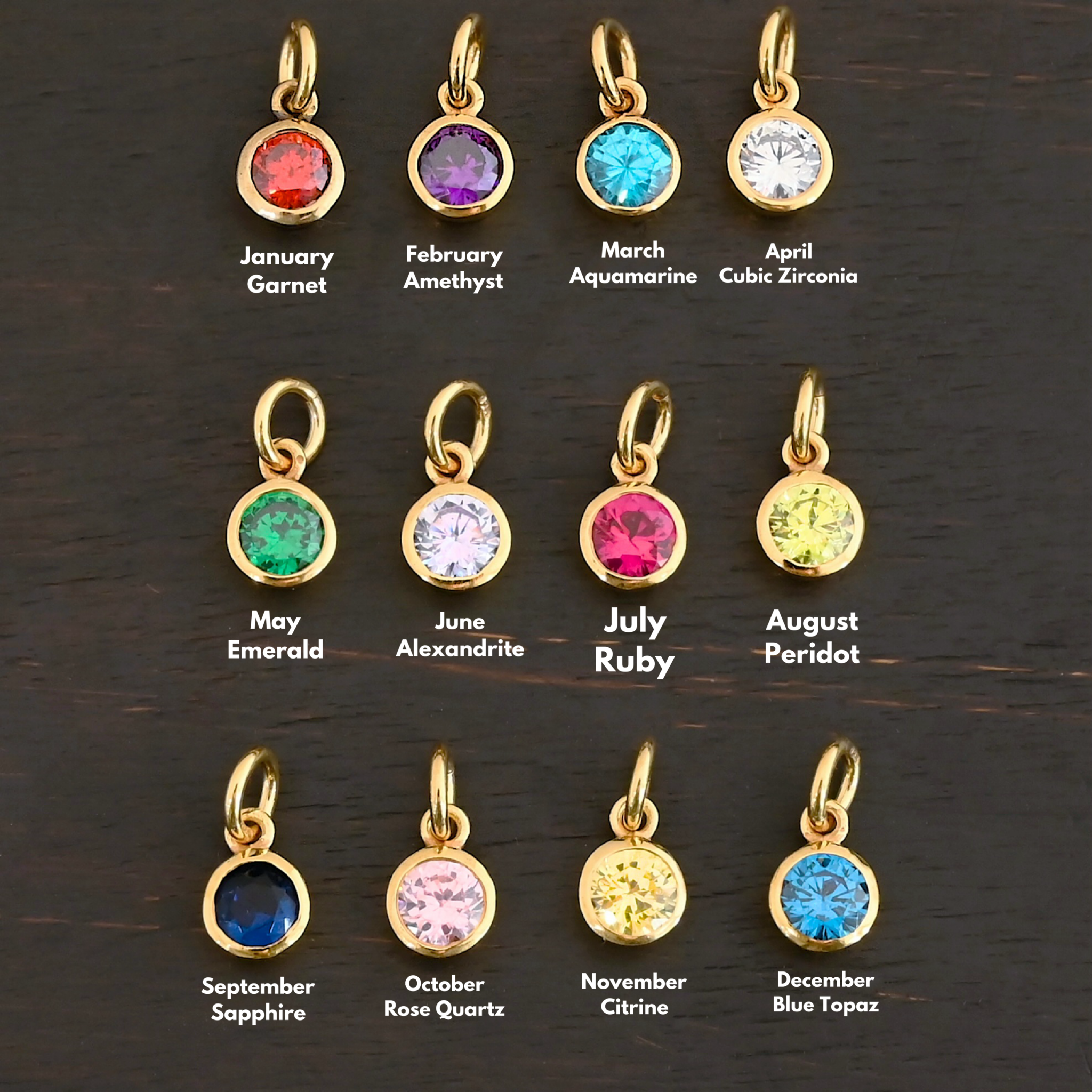 Gold Plated 6mm Birthstone Charm shown on dark background