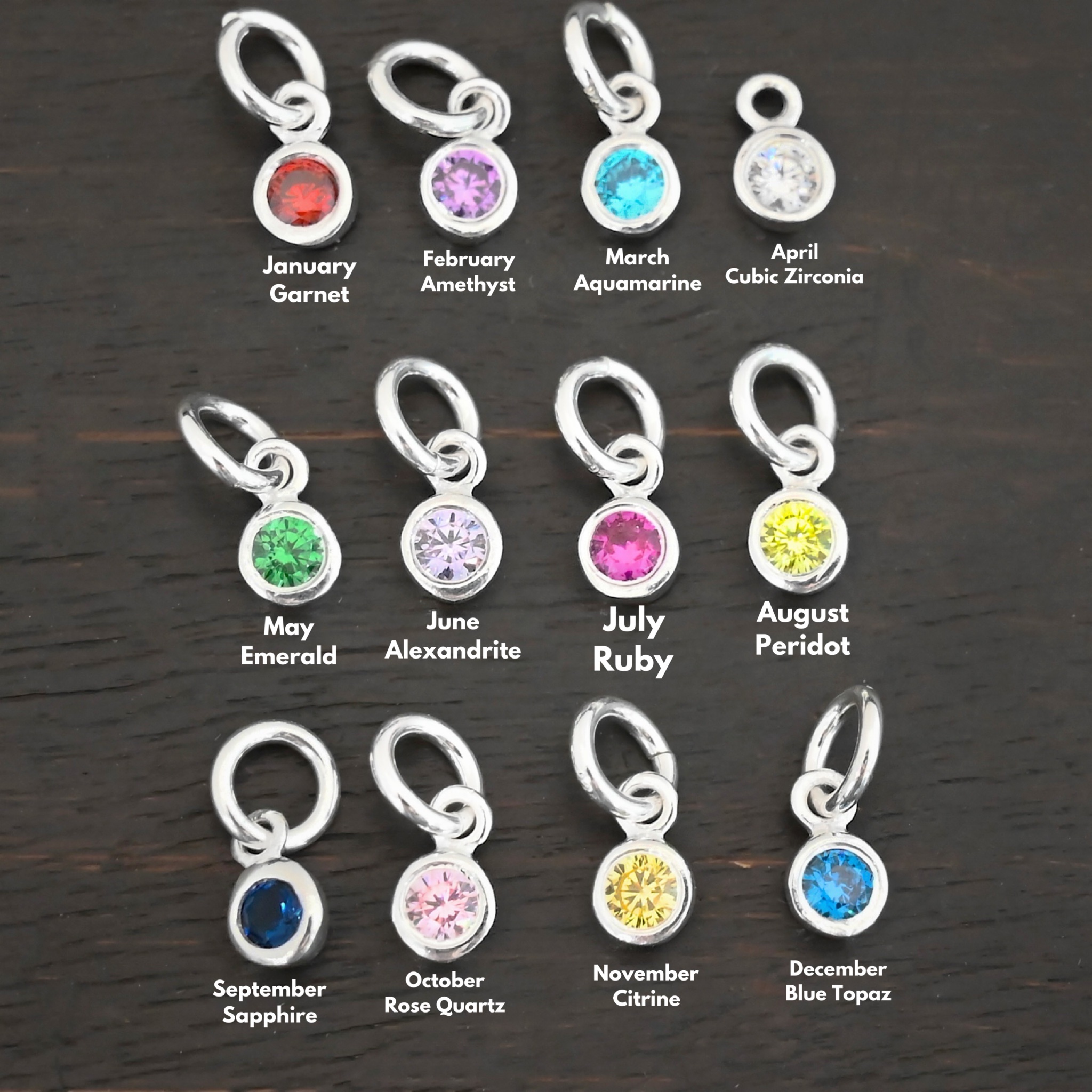 4mm Birthstone Charm Silver shiny 4mm Birthstone Charms shown on dark background