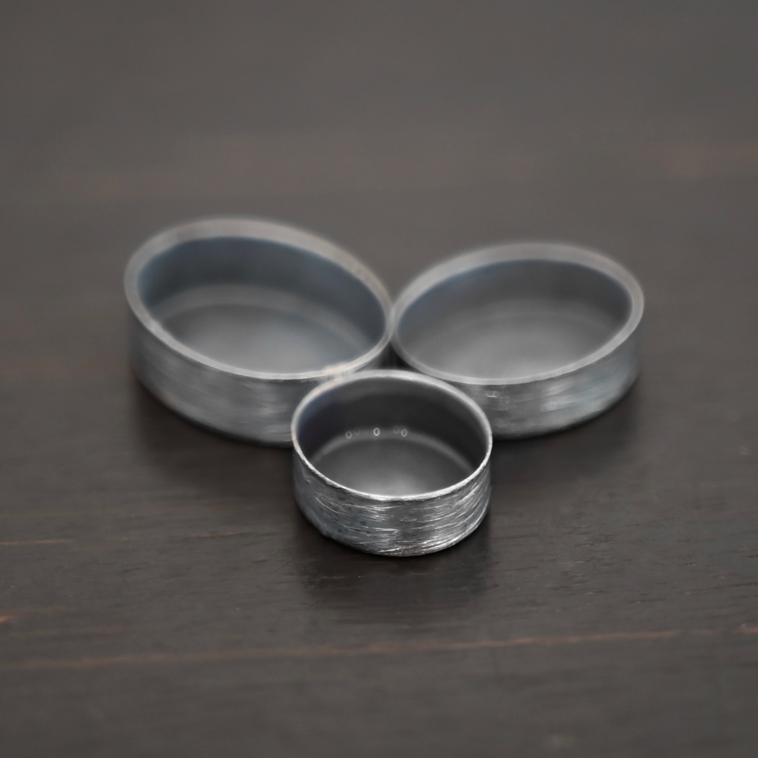 Tall Wall Oval Bezel Cup - oxidized shown on dark background