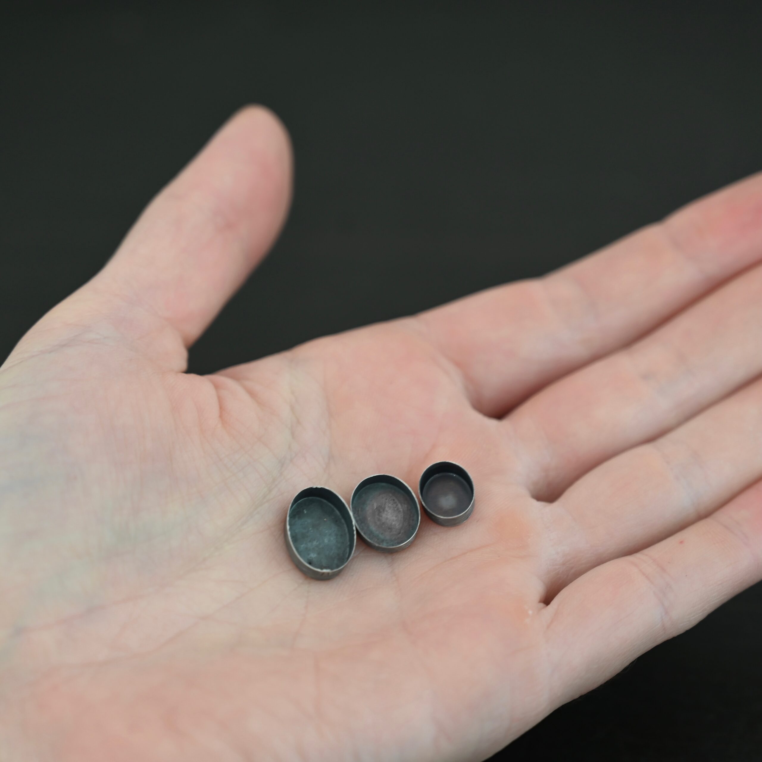 Tall Wall Oval Bezel Cup - oxidized shown in hand