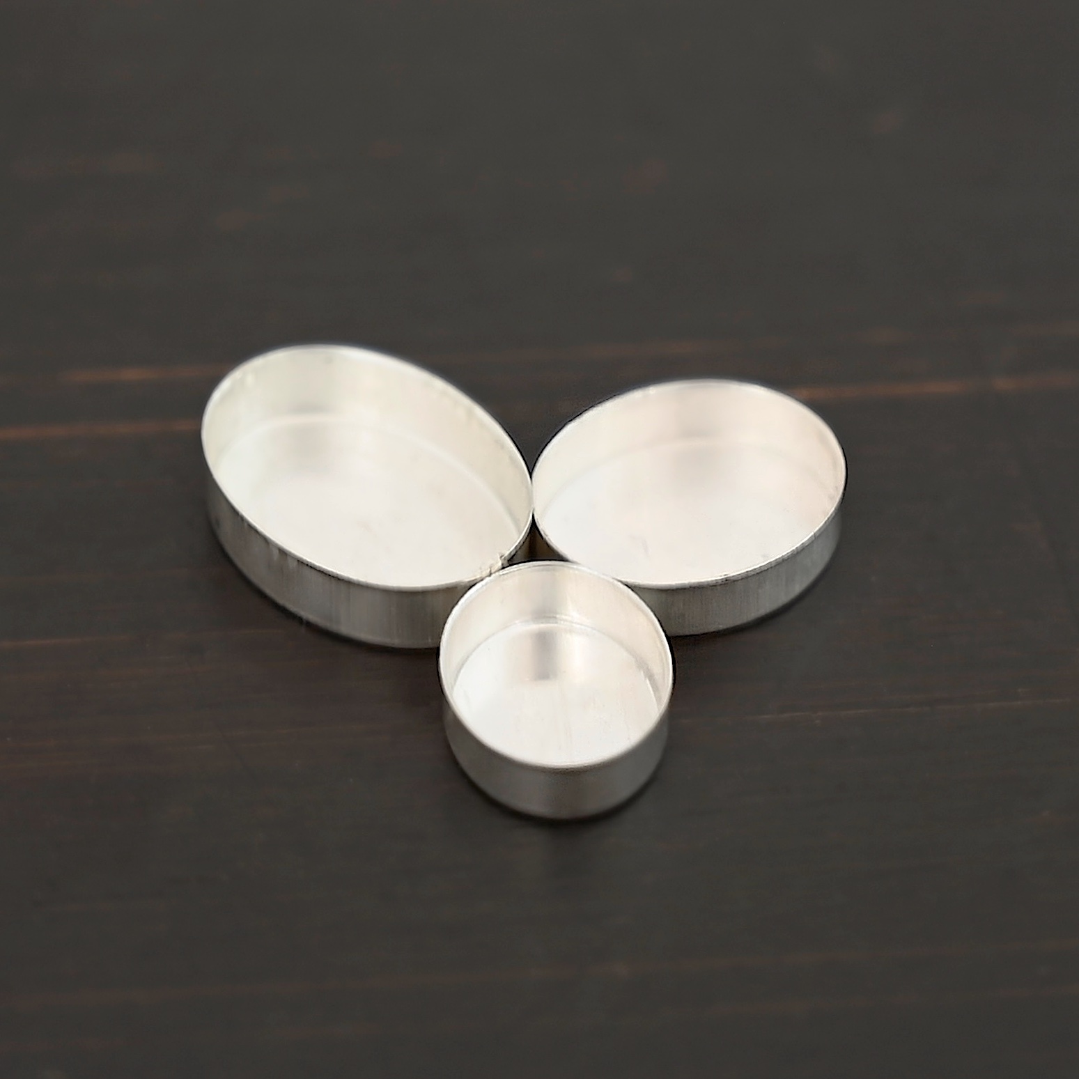 Tall Wall Oval Bezel Cup - shiny shown on dark background