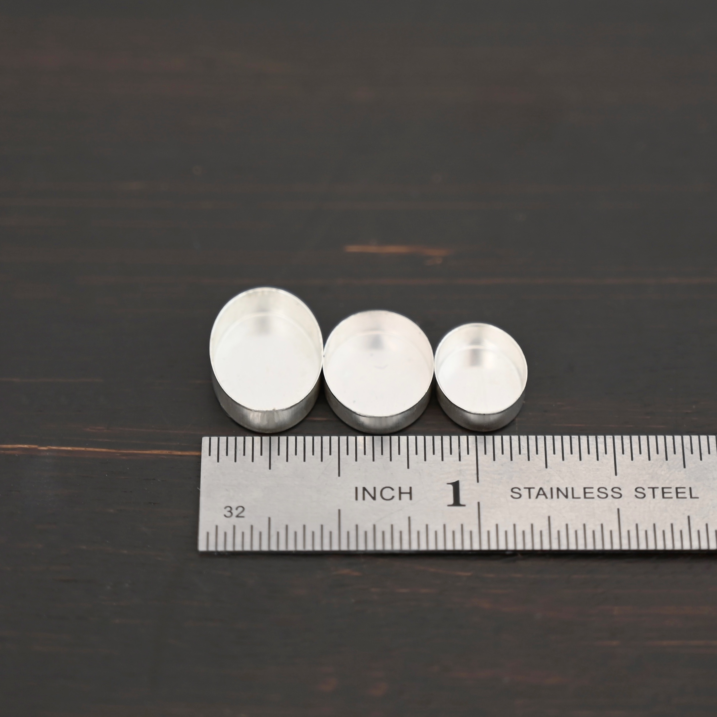 Tall Wall Oval Bezel Cup - shiny shown by ruler