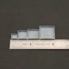 Thick square bezel cups - oxidized shown by ruler
