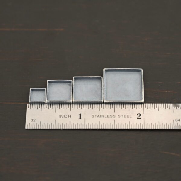 Thick square bezel cups - oxidized shown by ruler