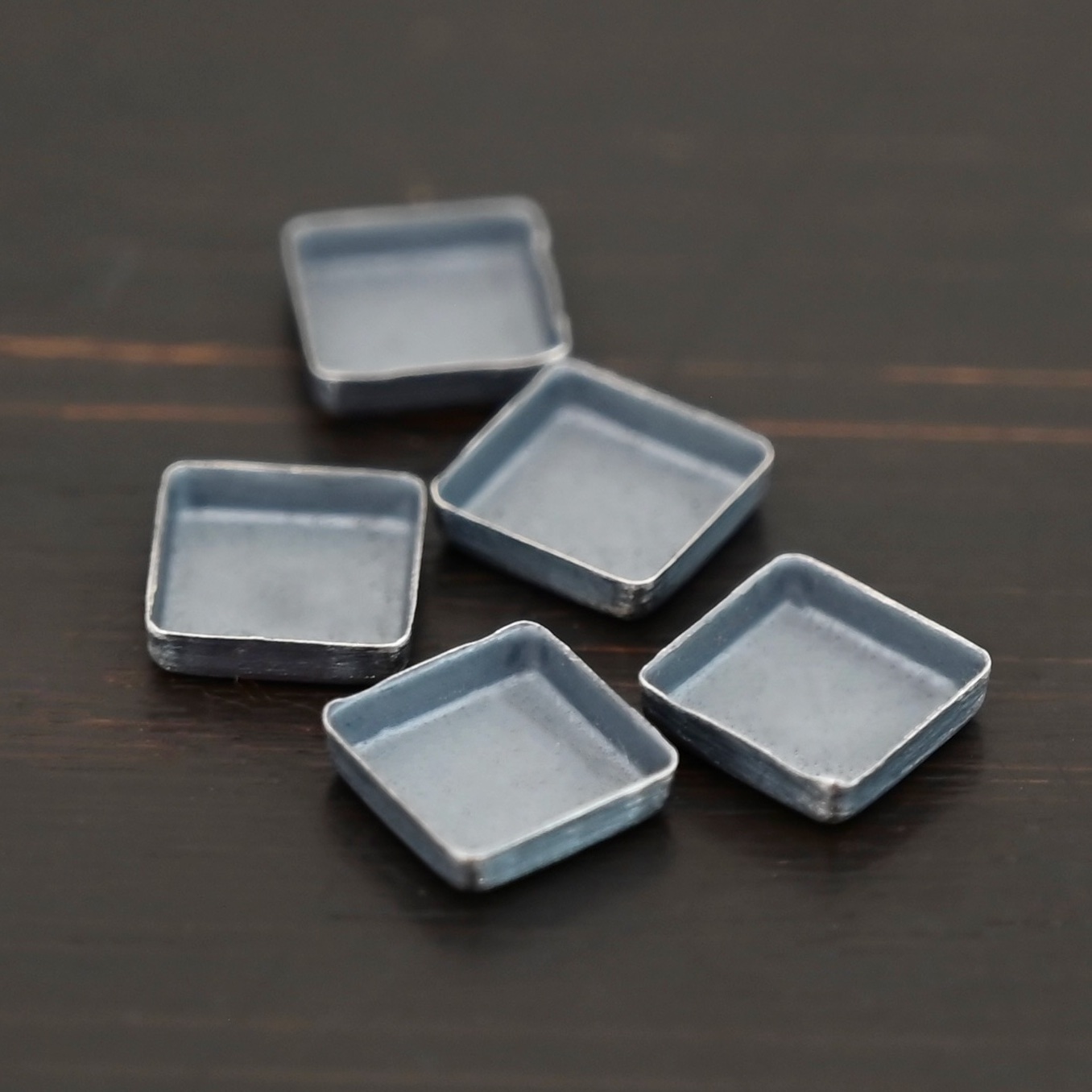 square bezel cups - oxidized square bezel cups - oxidized shown on dark background