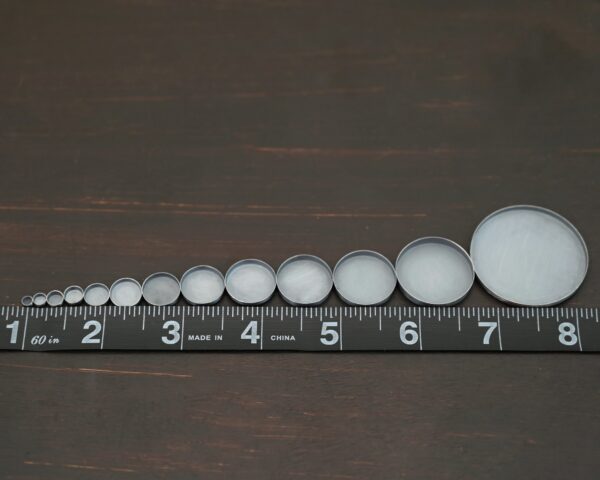 Round Bezel Cups - Oxidized shown by ruler