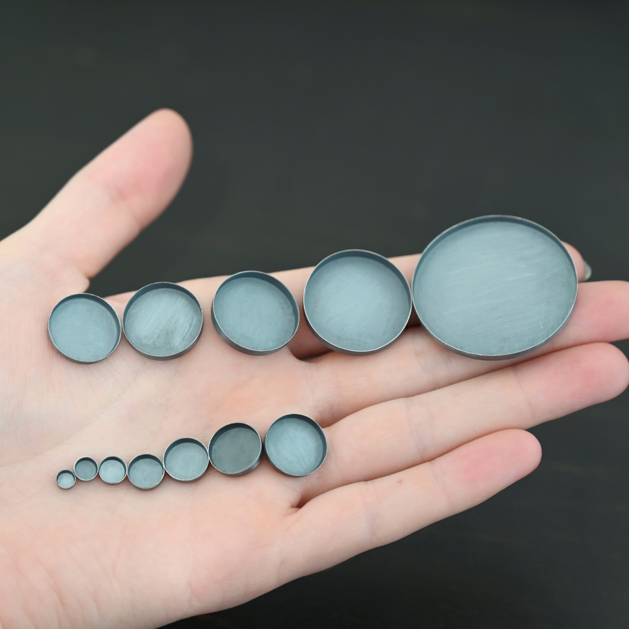 Round Bezel Cups - Oxidized shown in hand