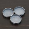 Round Bezel Cups - Oxidized shown on dark background