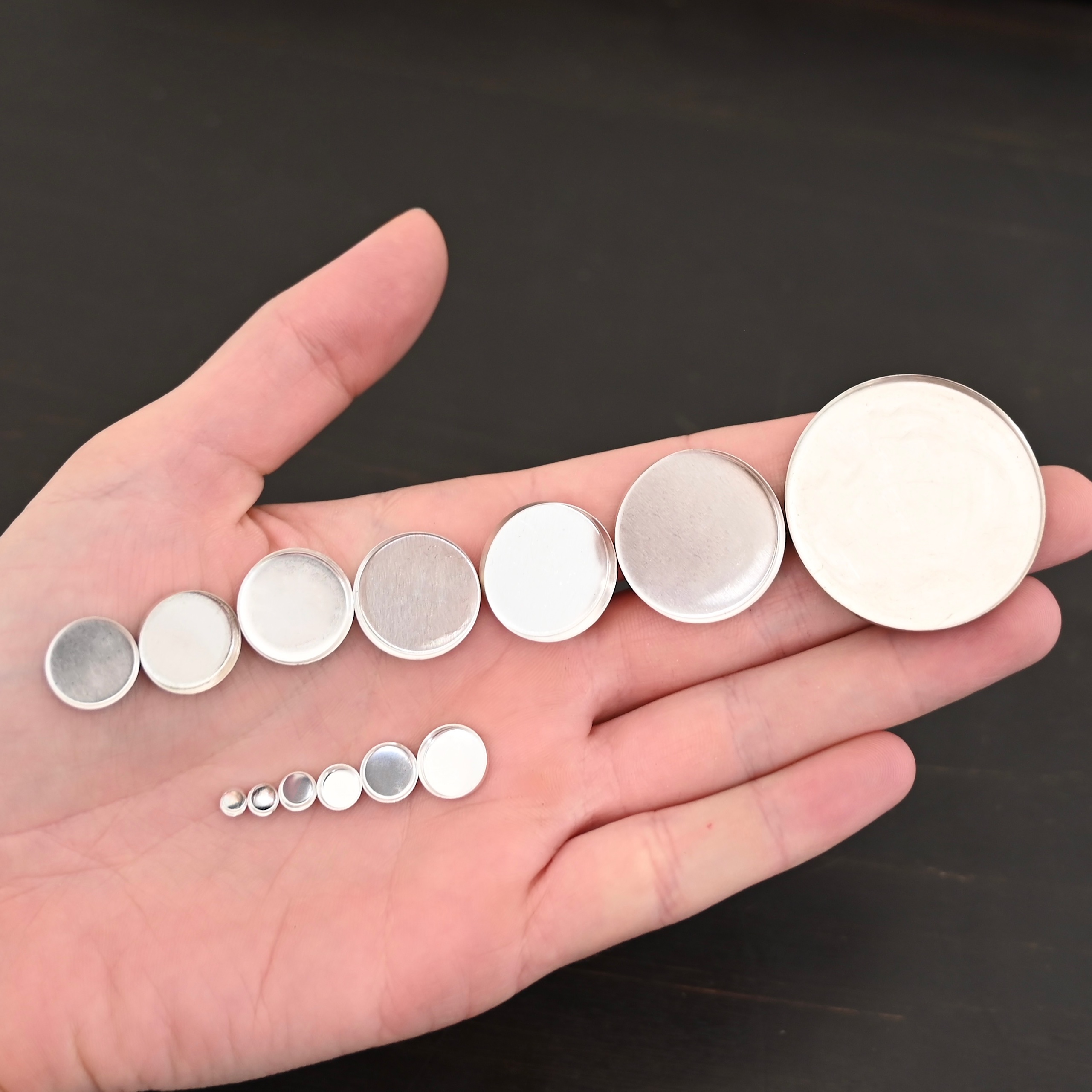 Round Bezel Cups - shiny shown in hand